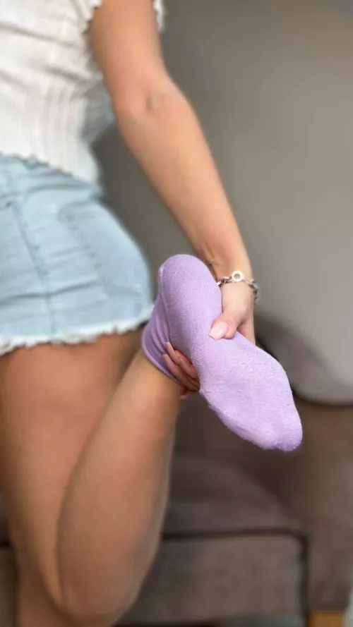 Touching the feet in socks is sometimes very ticklish [F]