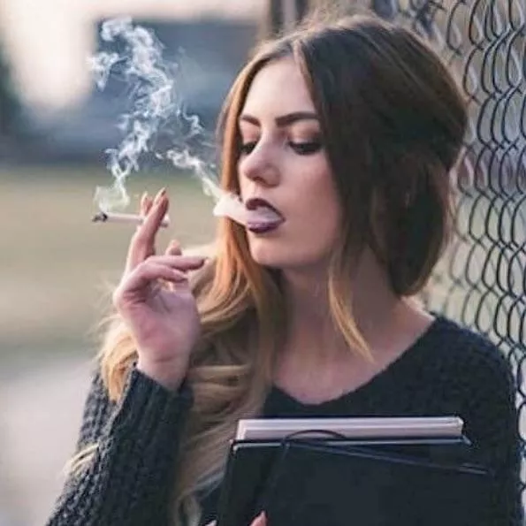 Transfixed by the beauty of her own smoke