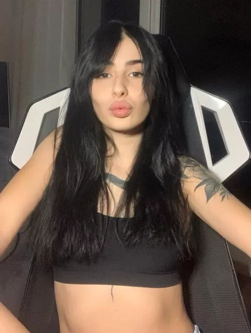 Black hair, black top