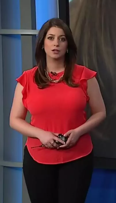 Busty News Anchor Tries to Hide Them