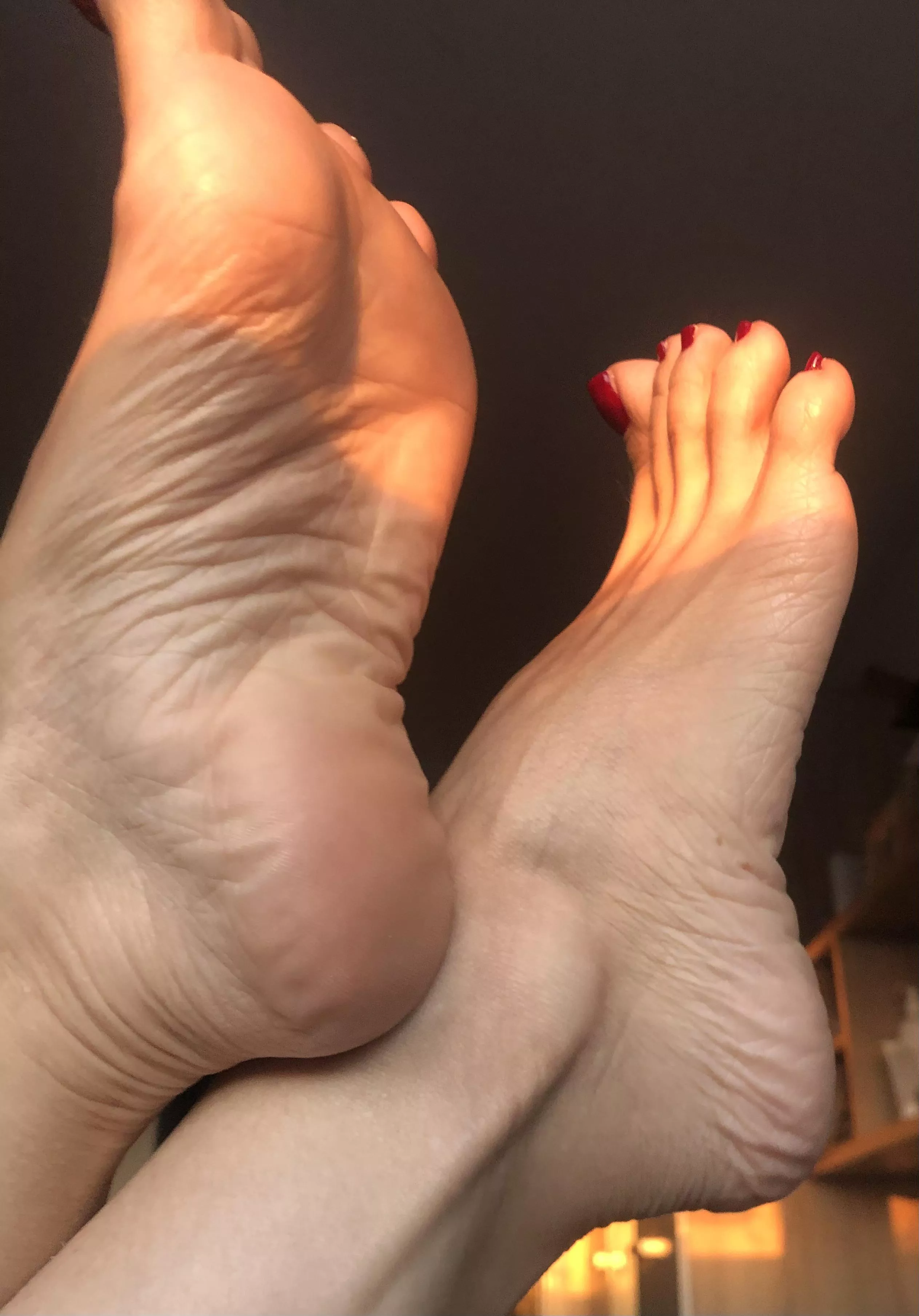 My feet and the glare of the sun's rays