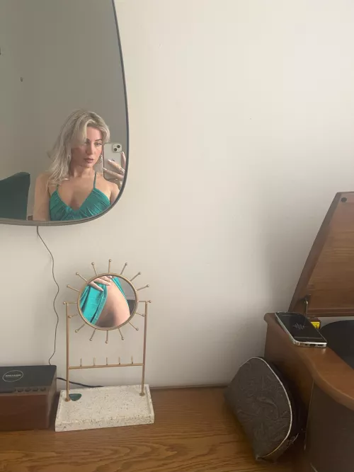 This mirror shows enough while letting your imagination do the rest
