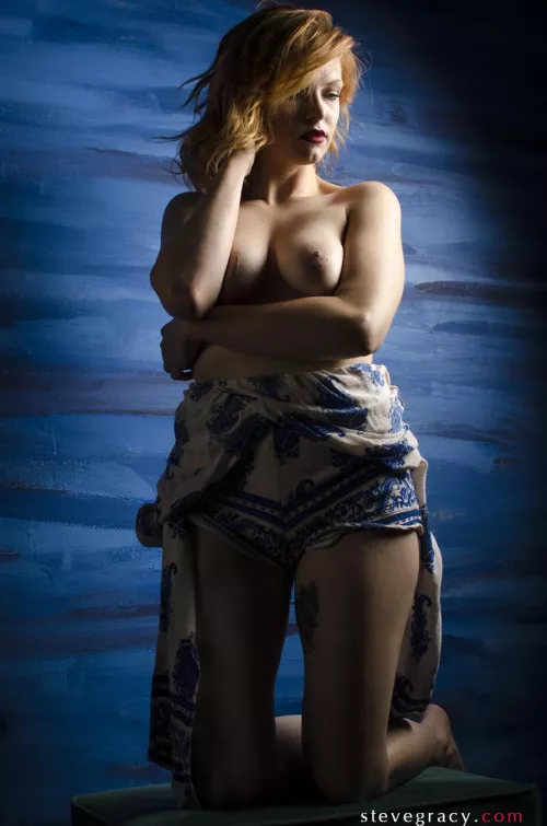 Keli on the blue wall