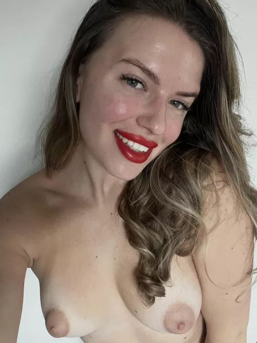 My boobs or my smile
