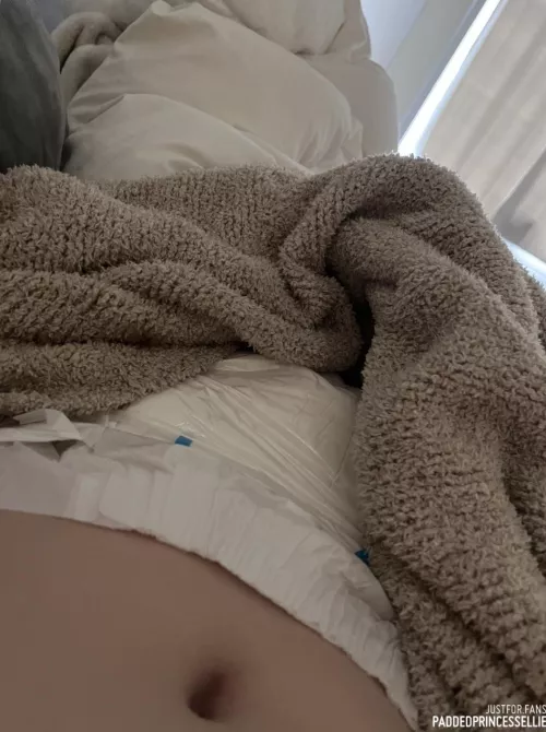 hiding my very full diaper under the blankets 🙈