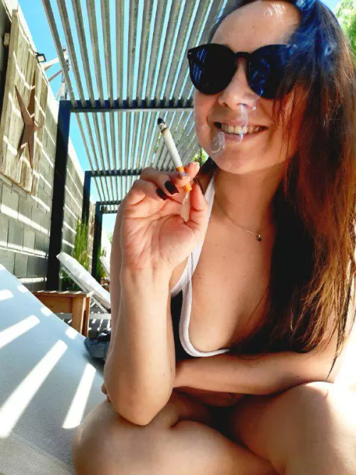 The heat is better enjoyed with a cigarette in hand