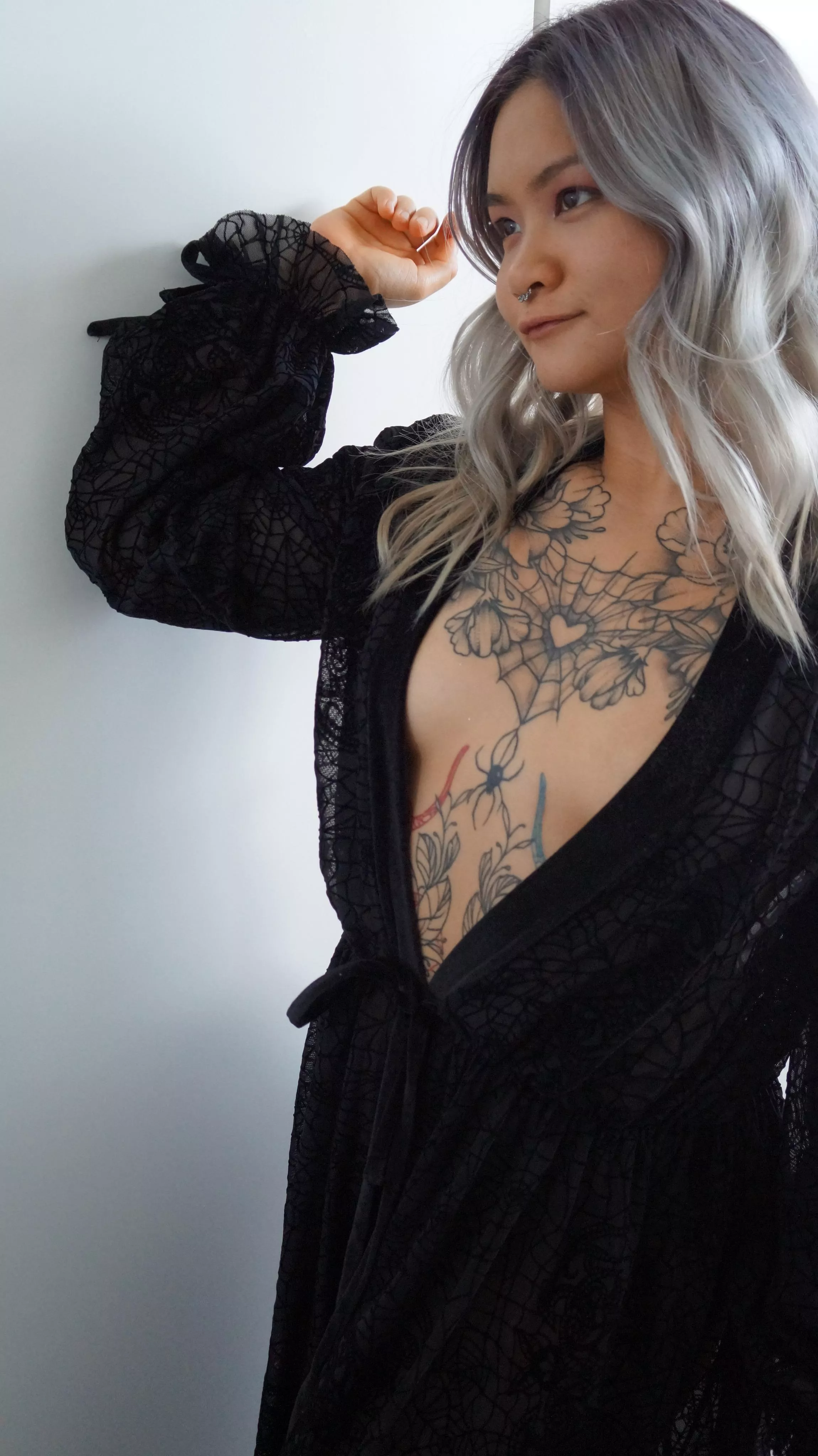 The spider webs on my robe match my tattoos