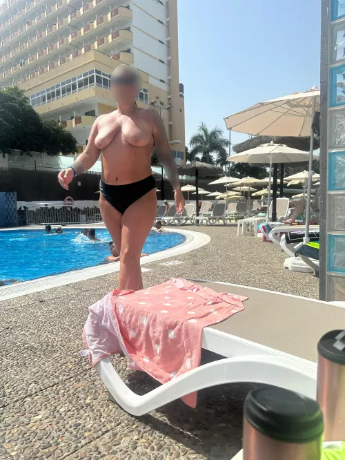 Topless at the pool on holiday is the best