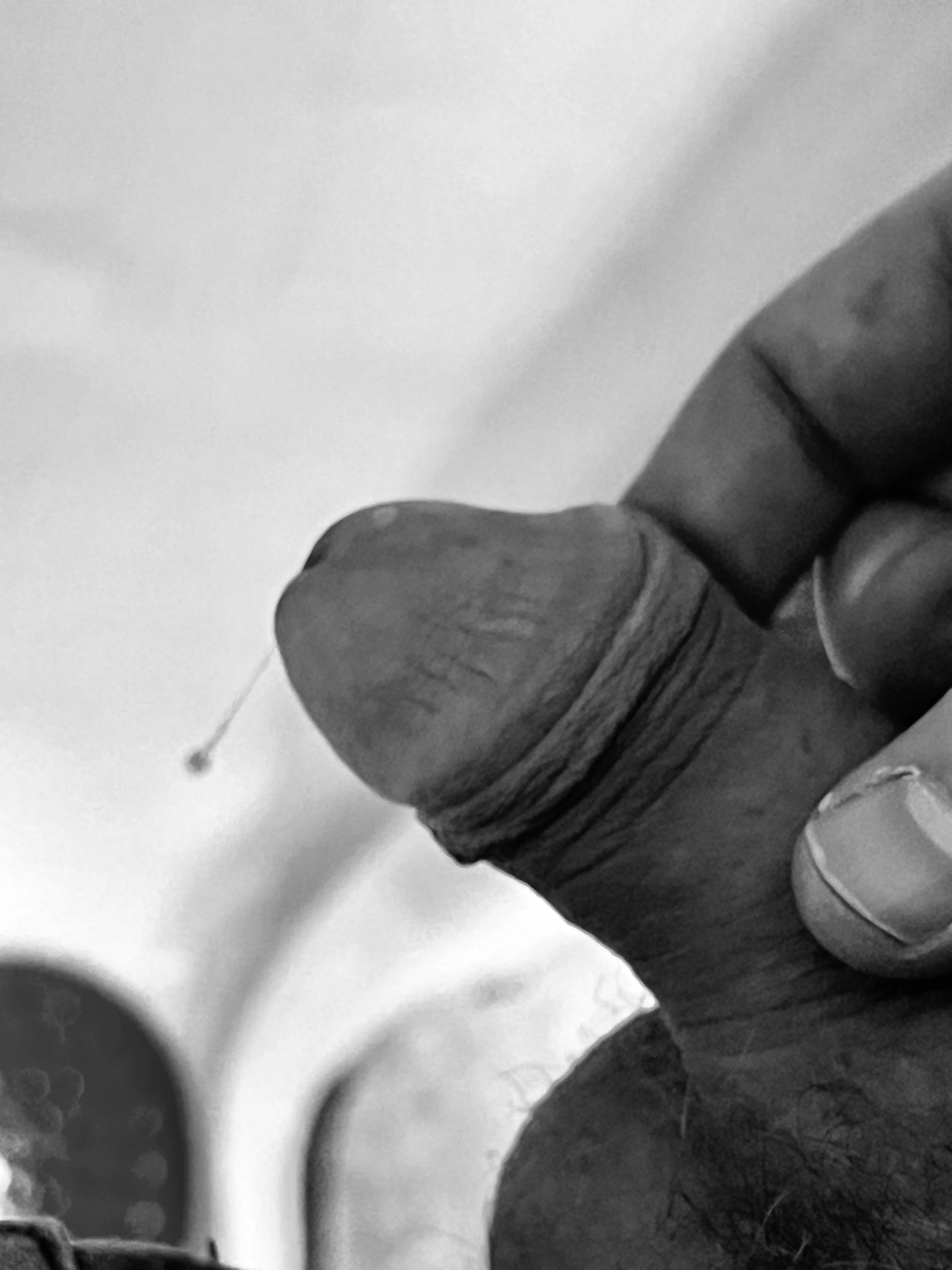 Dripping precum at the urinal