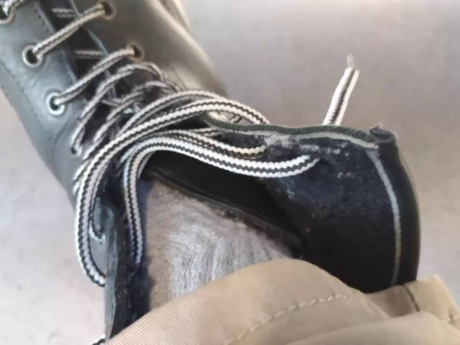 How to fix my boots so the tongue doesn't slip sideways?