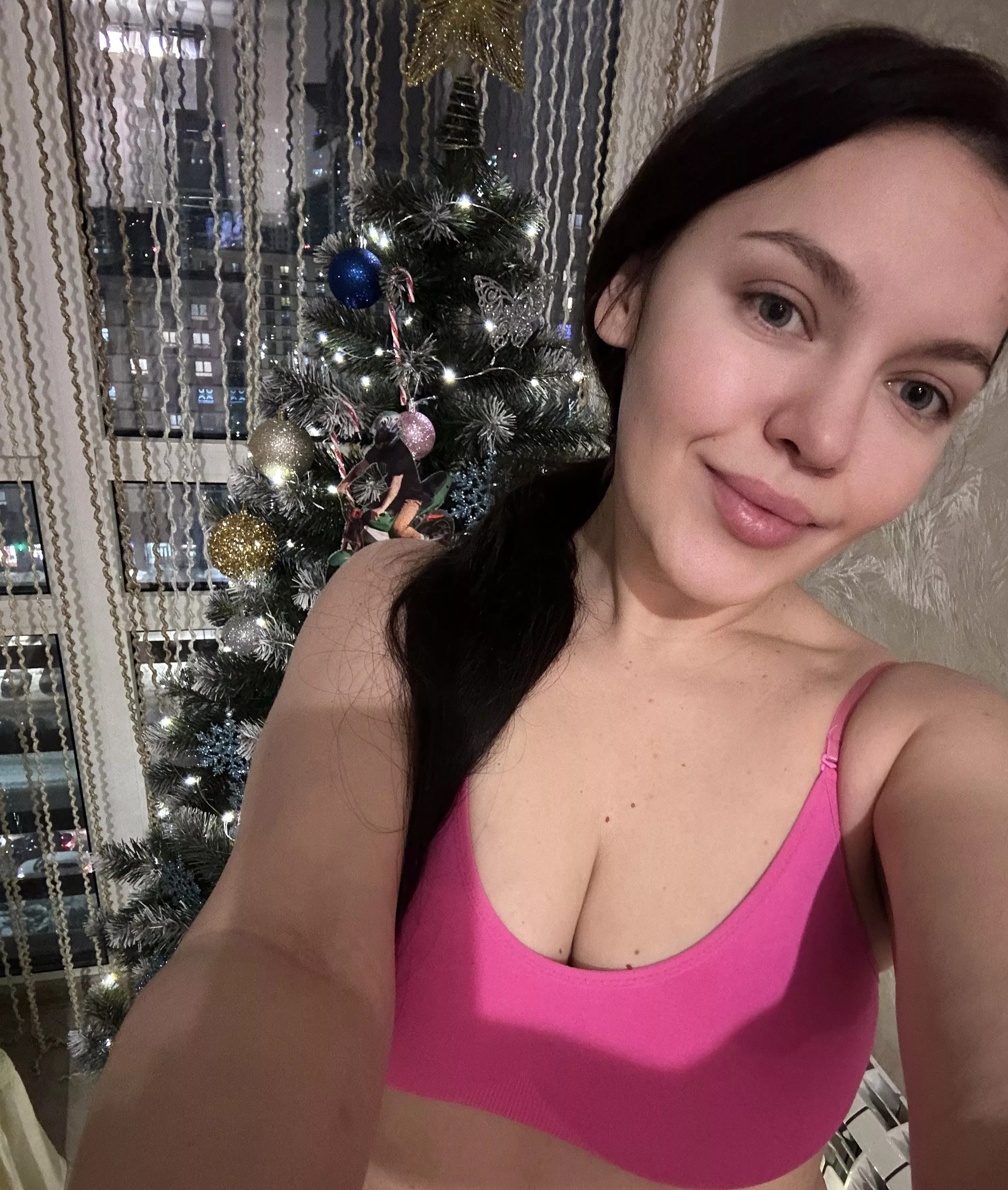 Christmas selfie in a pink top