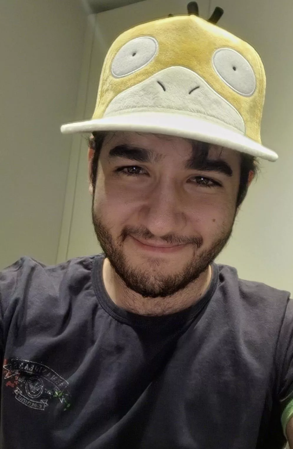 I was gifted a psyduck cap it looks so goofy lol