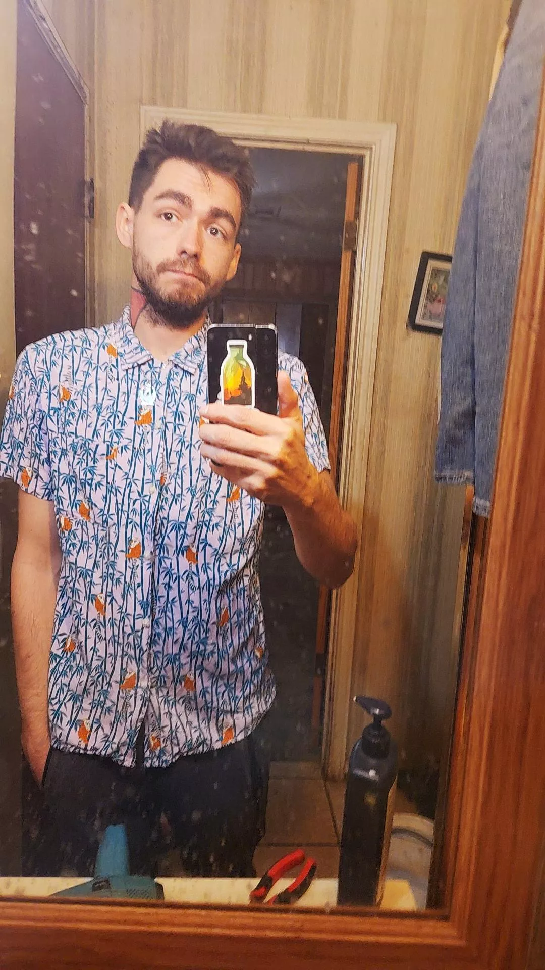 New shirt and a dirty mirror.
