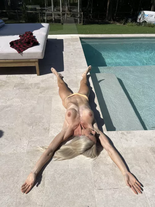 Wild blonde at a pool party