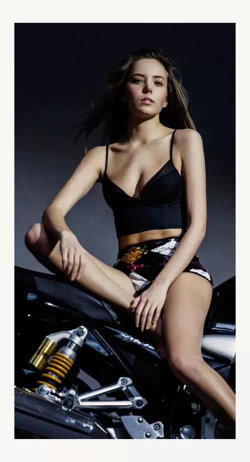 Katya Clover on a motorbike made by Pedro Saudek