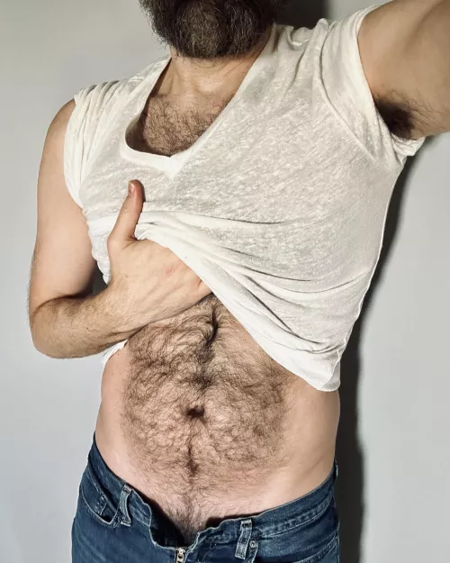 You never know what a bloke's hiding under his shirt...