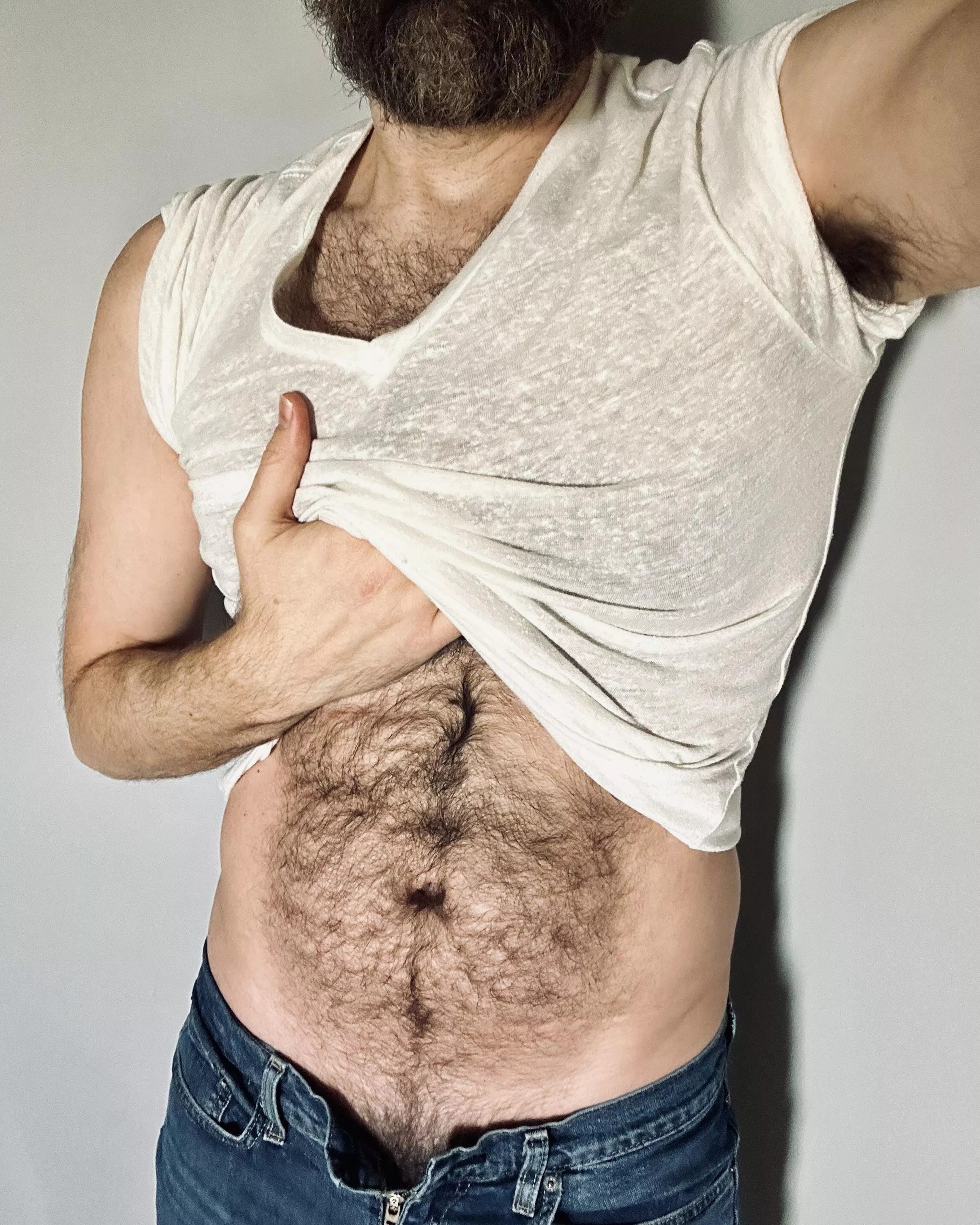 You never know what a bloke's hiding under his shirt...