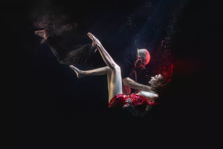 Tied and dragged to the bottom of the ocean