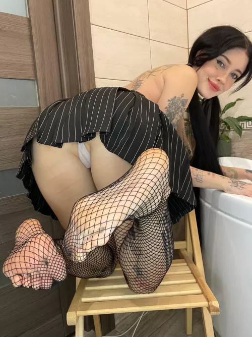 What's hotter than long legs in fishnet stockings like mine