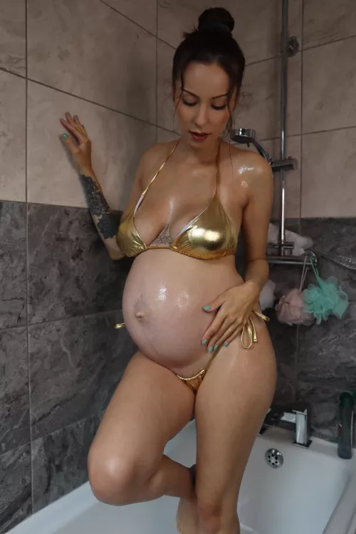 Bikinis look so much hotter in pregnant women