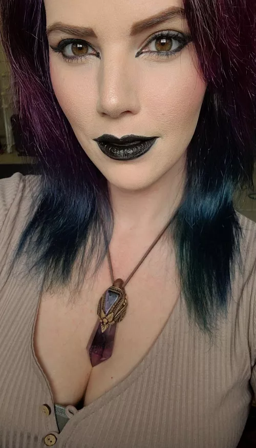 Black lipstick and angel eyes