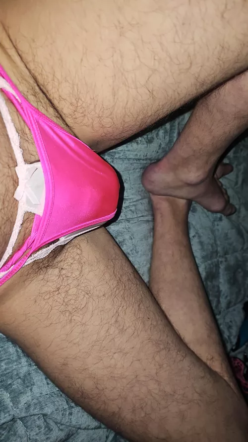 In pink panties. Who wants to see the back.