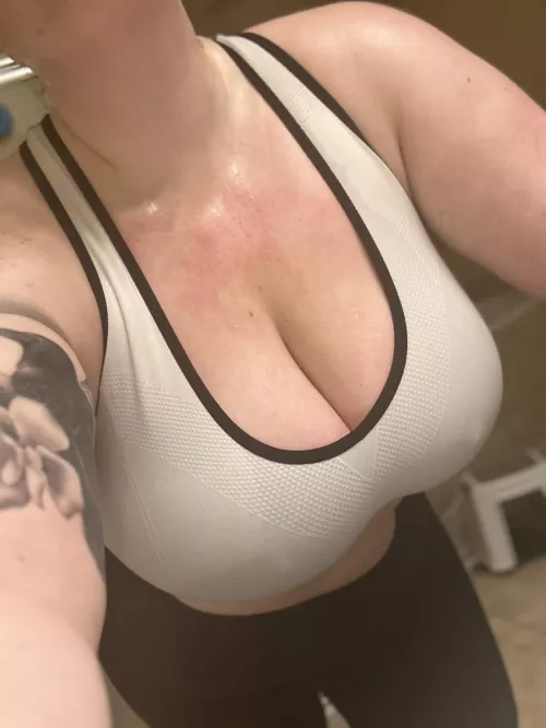 The sweat is dripping and the cleavage is deep
