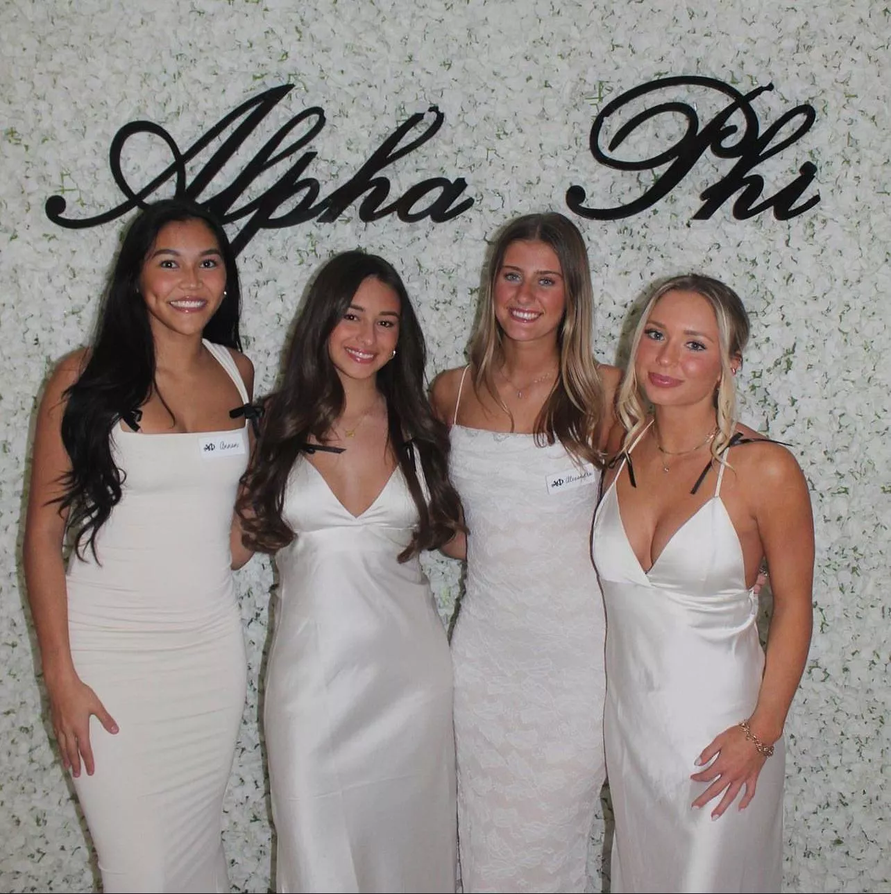 Sorority girls in white dresses