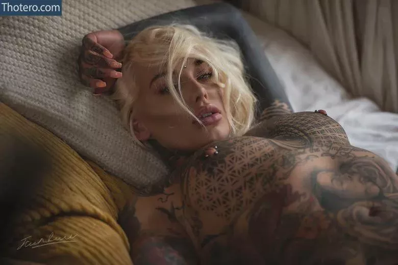 all tits must have tattoos and piercings on them