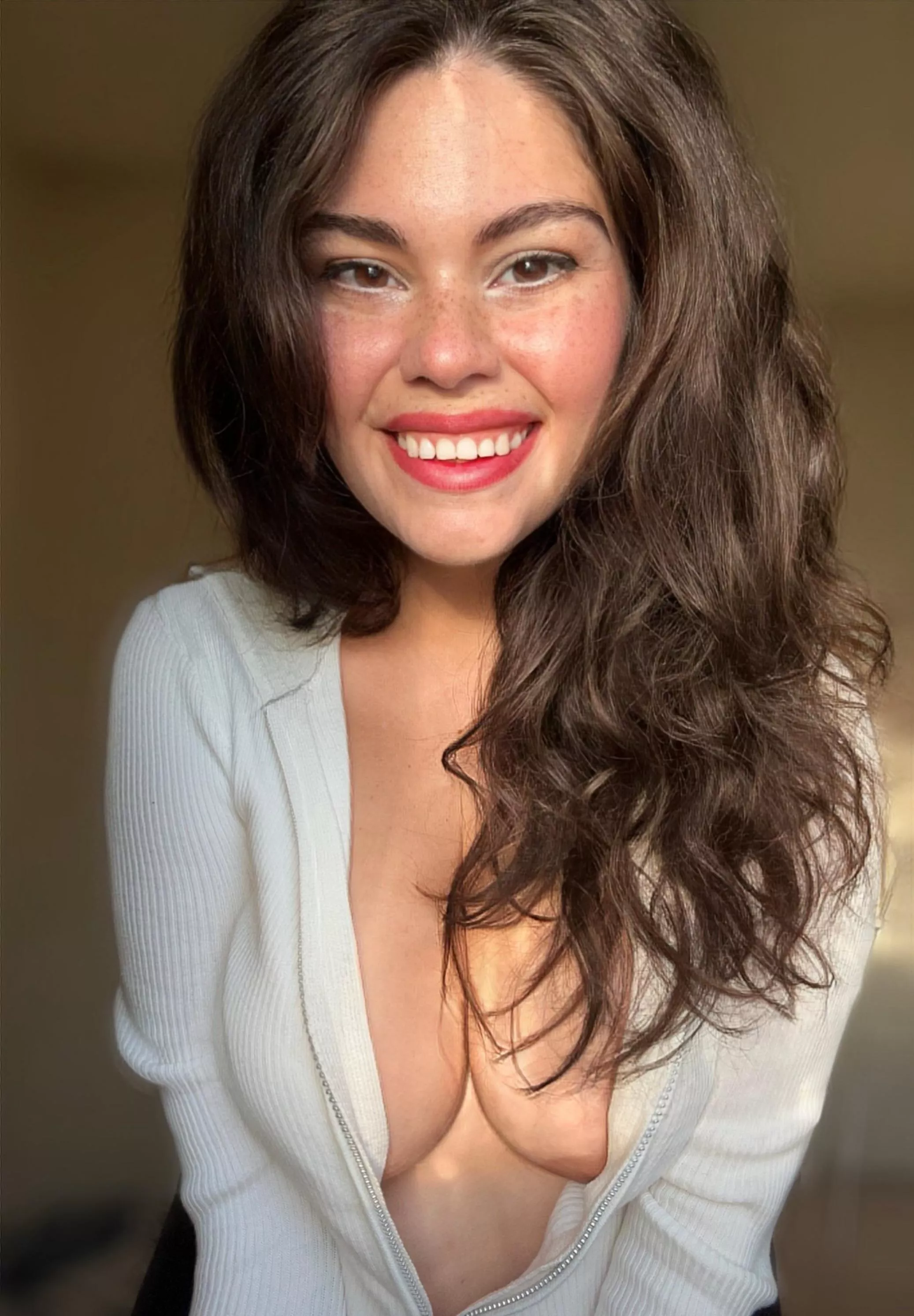 Freckles, smile, and a nip slip