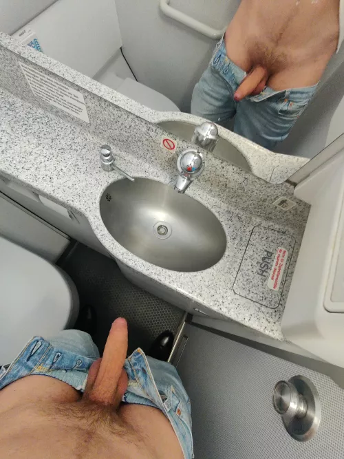 Horny uncut on a plane