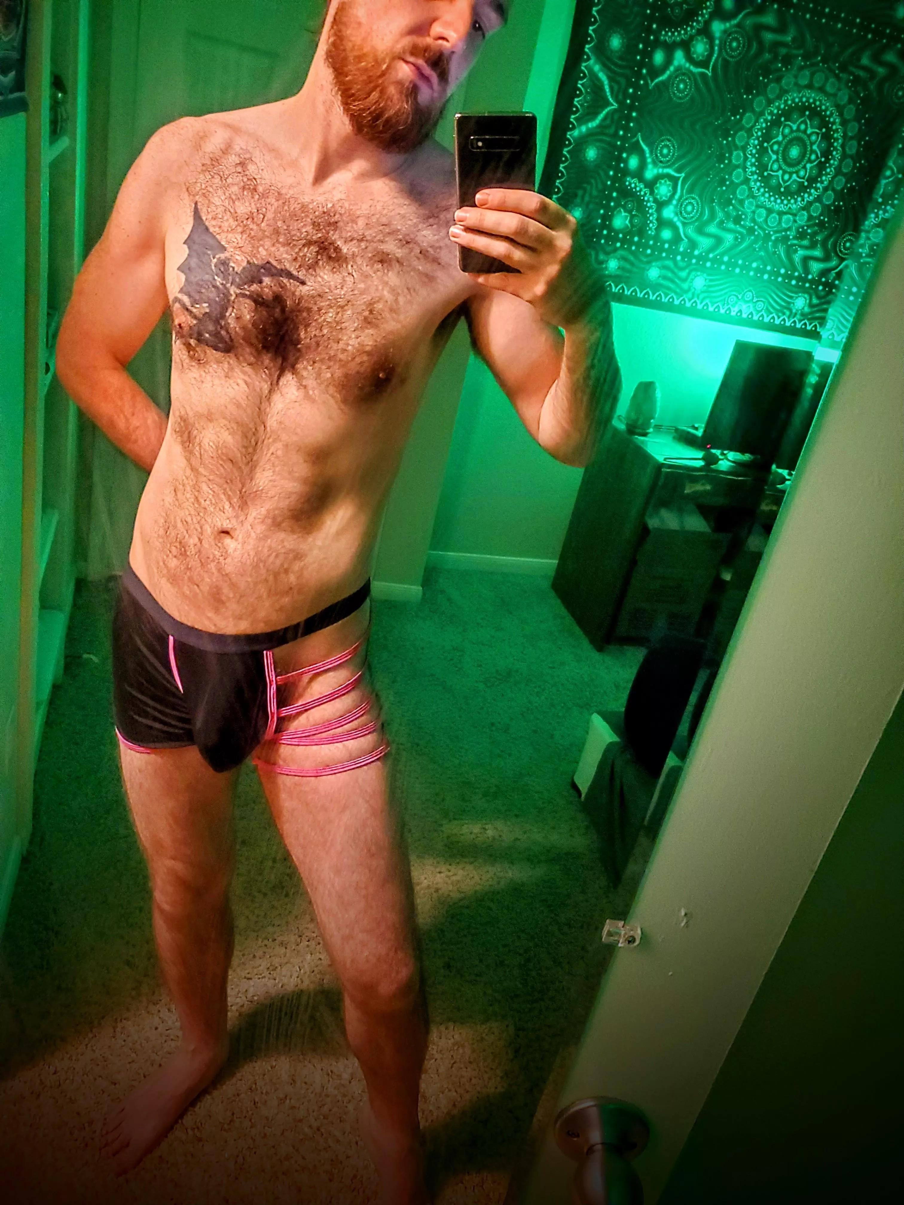 Like a femboy, but hairier. Way hairier.