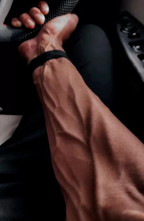 one hand on the wheel, the other gripping your thigh maybe?