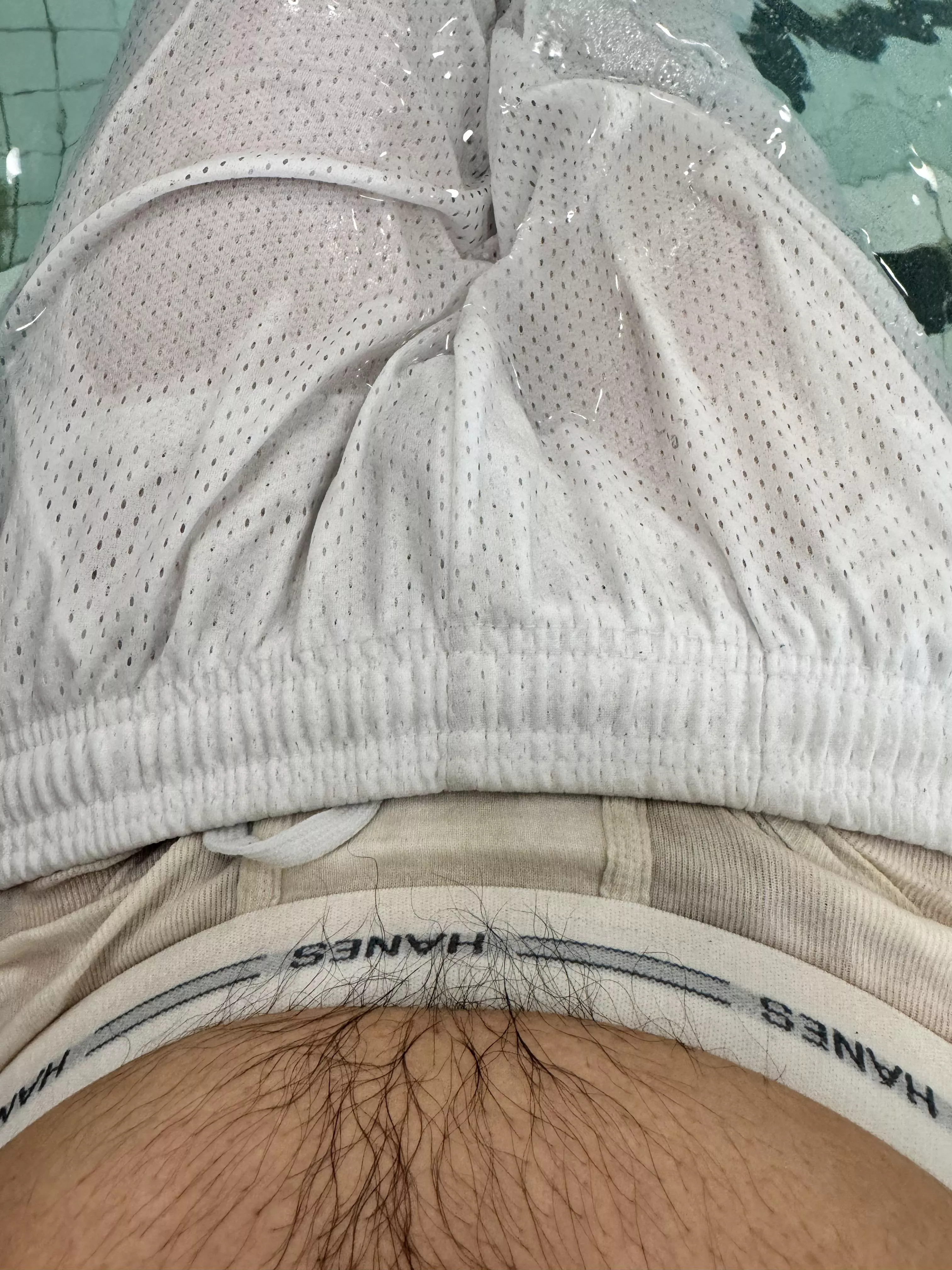 Piss filled Hanes briefs sag with bball shorts in the spa at gym