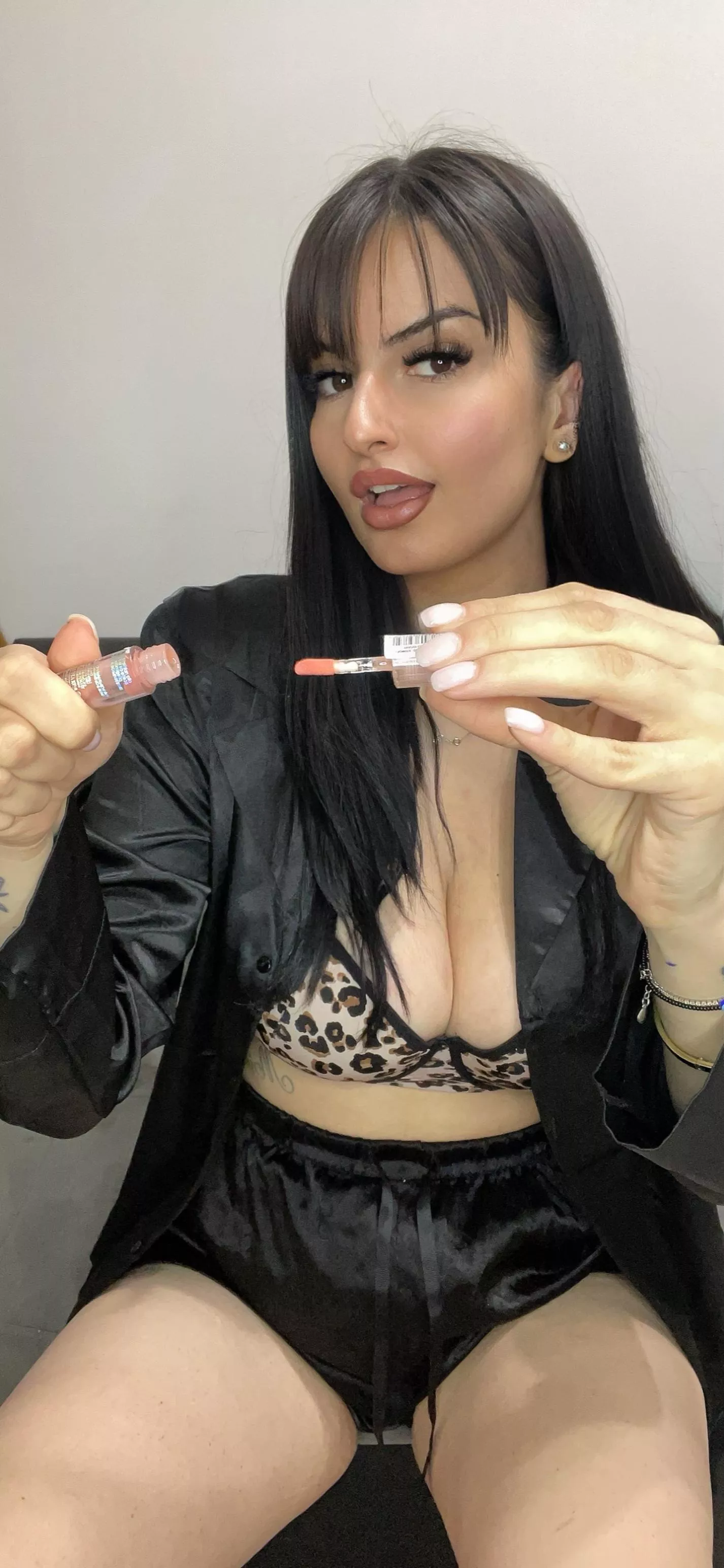 Mommy got you this little lip gloss when she was out shopping. Can I help you put it on?