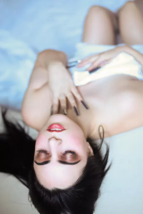 Naked in white sheets