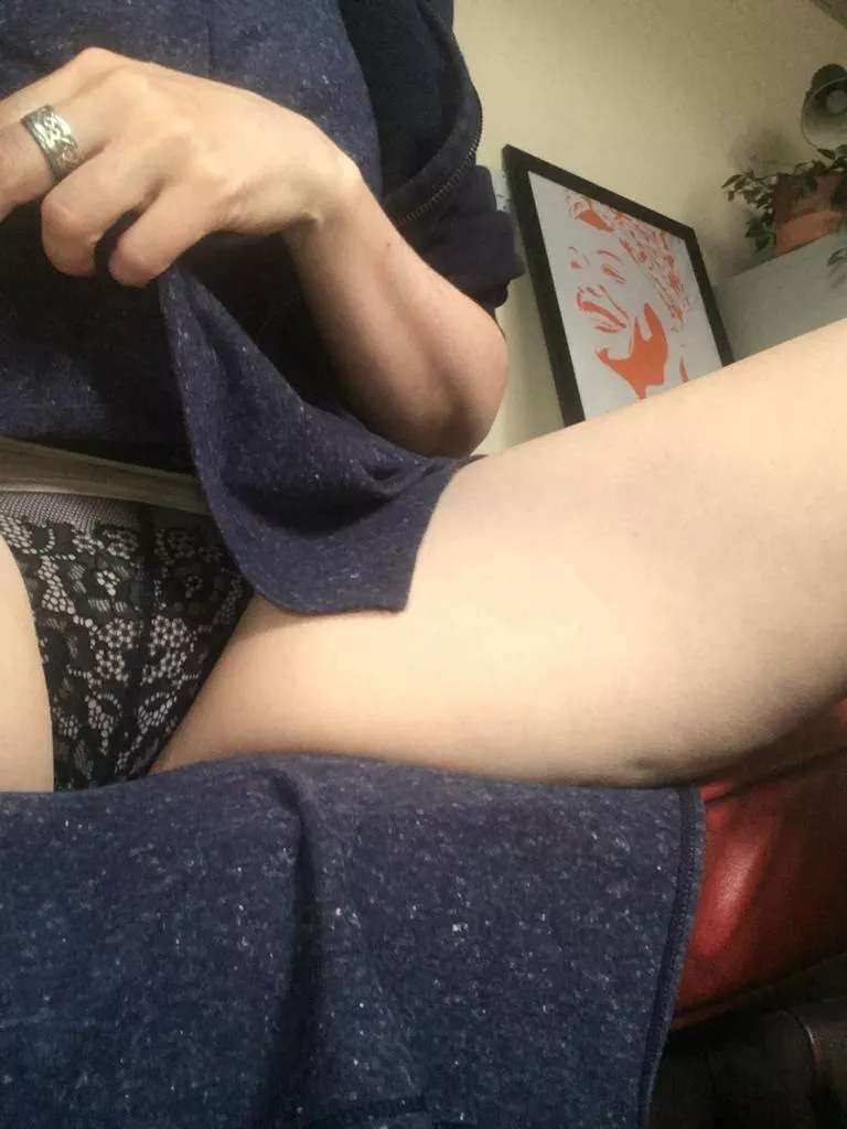 Exhibiting herself from her office as instructed.