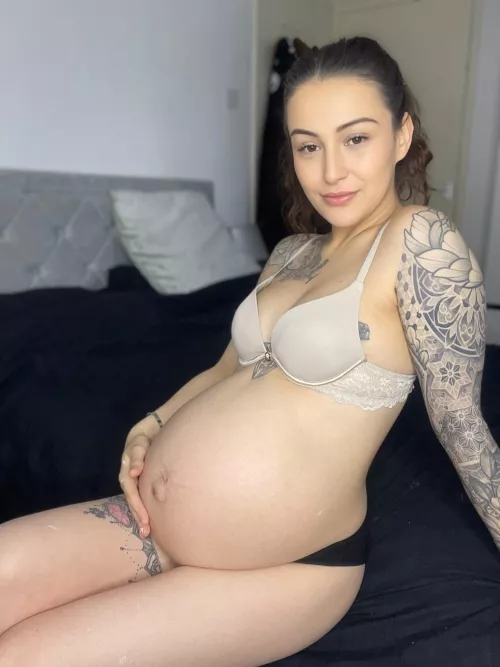 Heavily pregnant British MILF