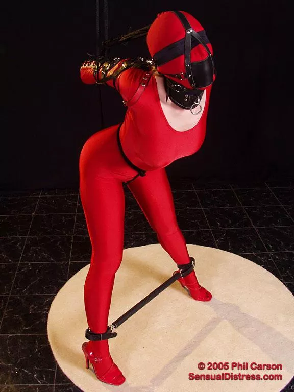 The Red Spandex Makes it Look Hot