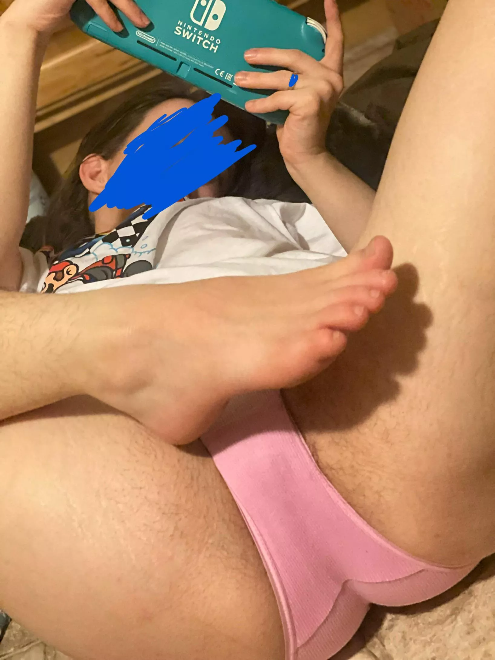 You play with my toes. I’ll play my game.