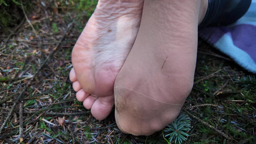 Nylon and bare feet in the forest