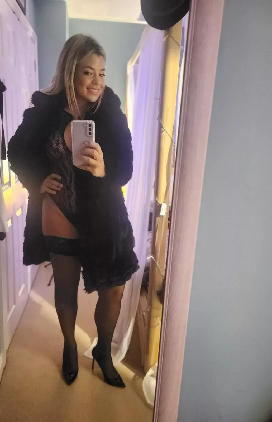 Under the coat, some sexy thigh highs