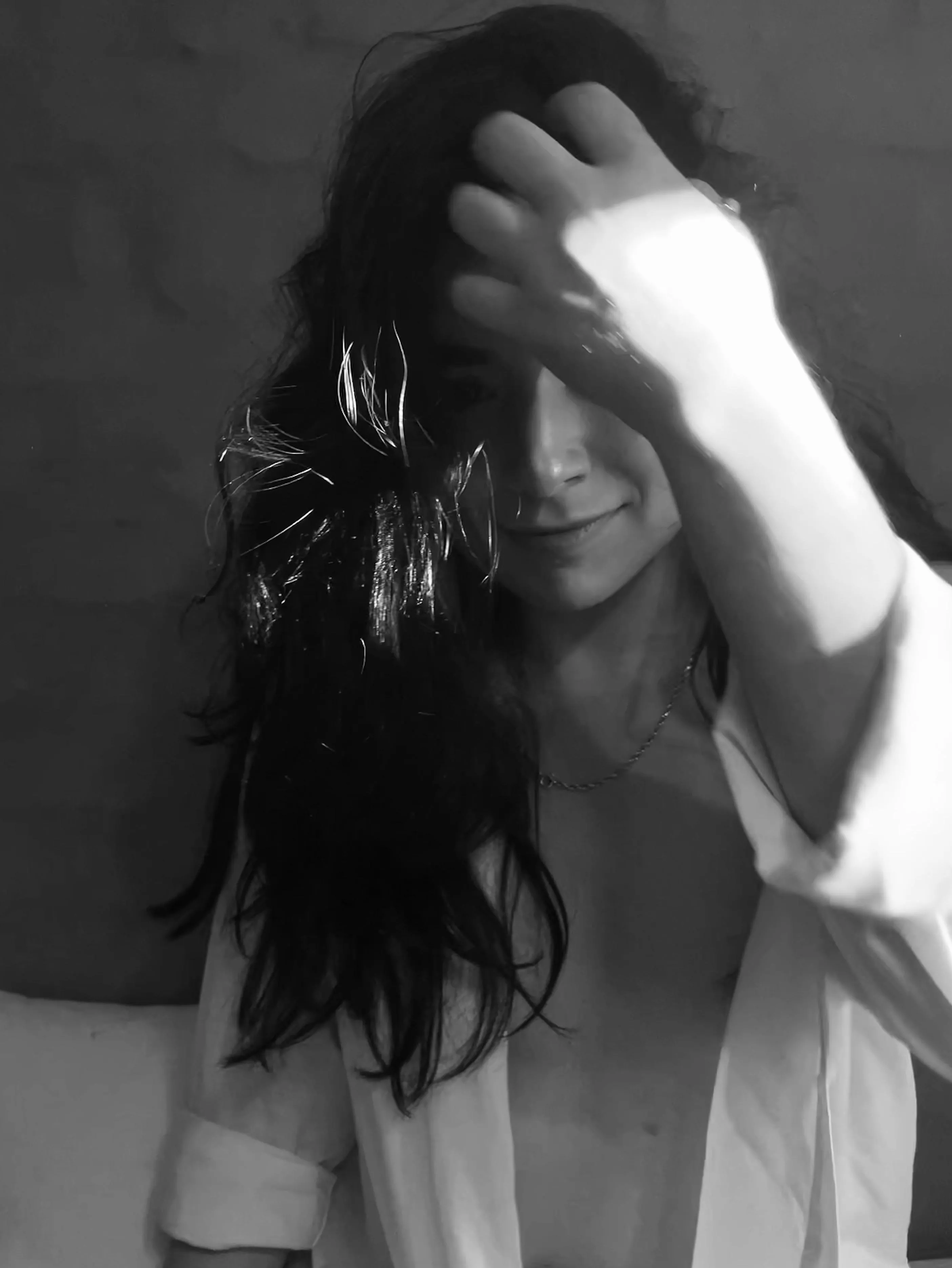 Like the moon; part of her is always hidden.