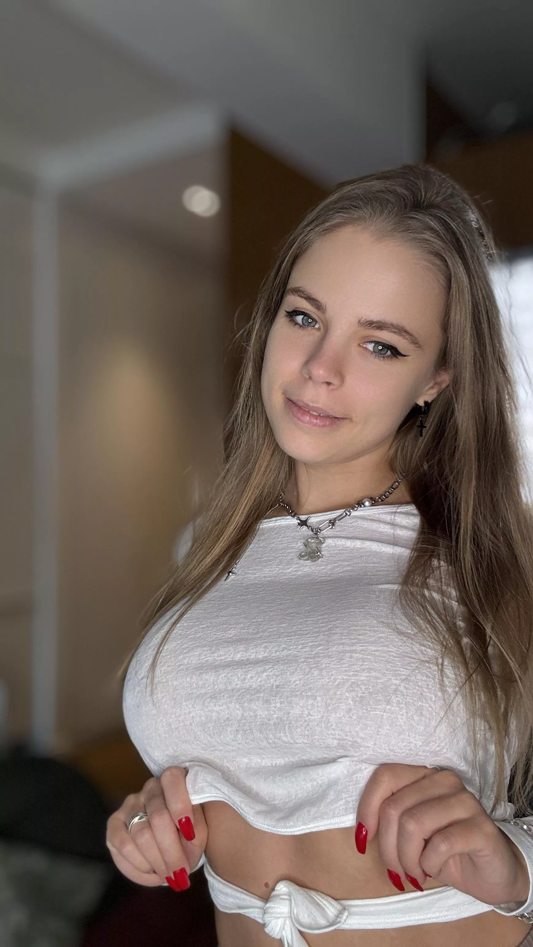 Love this cute little white but slightly see-through top