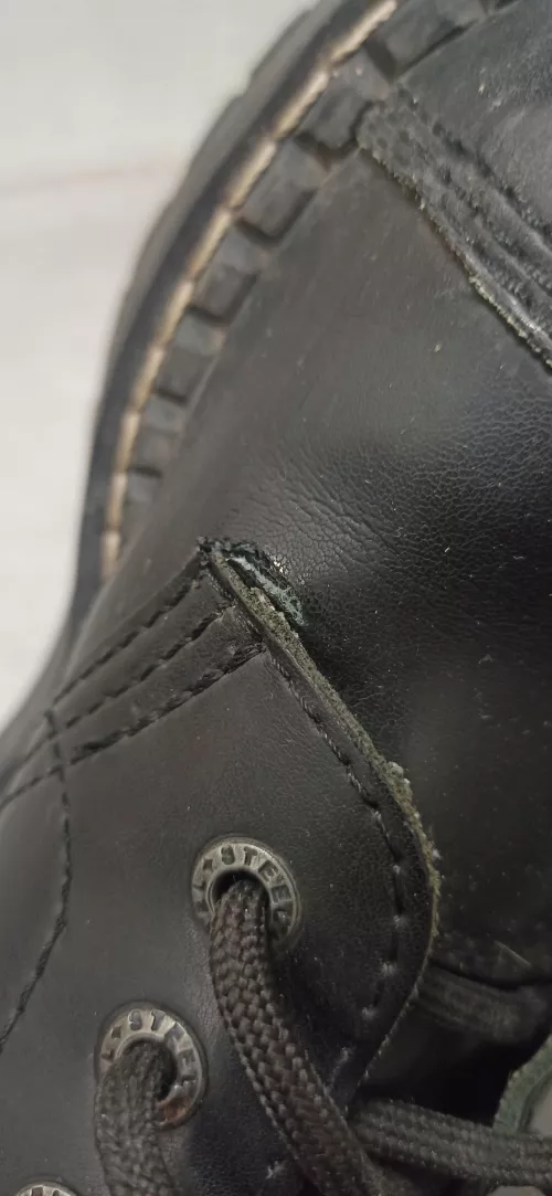 Hi everyone, any advice on how to deal with this unfortunate crack? Is it something I could fix at home or do I need to take those to a cobbler?