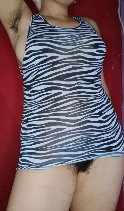 Without panties and with the bush peeking out