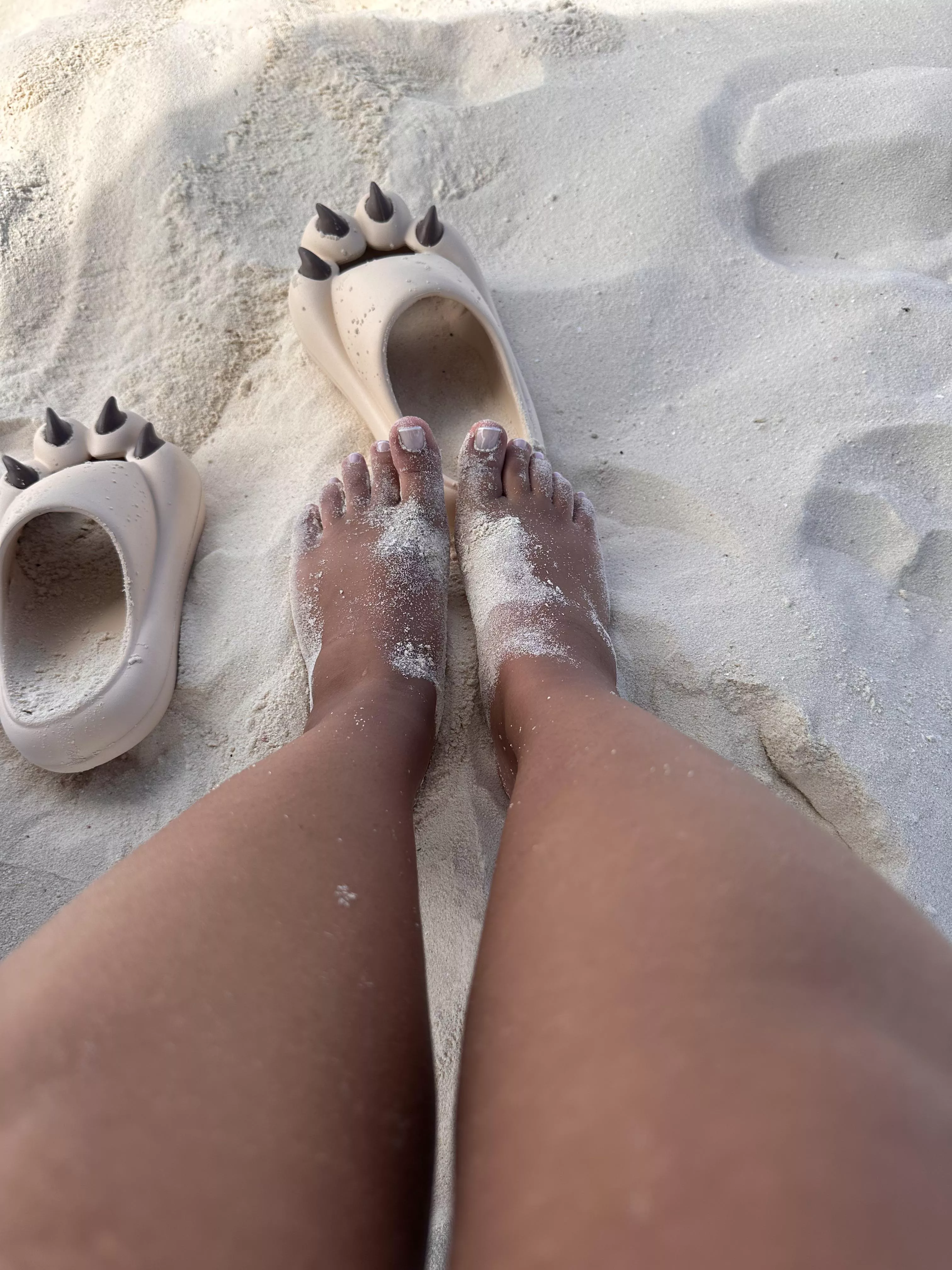 Cute feet at beach