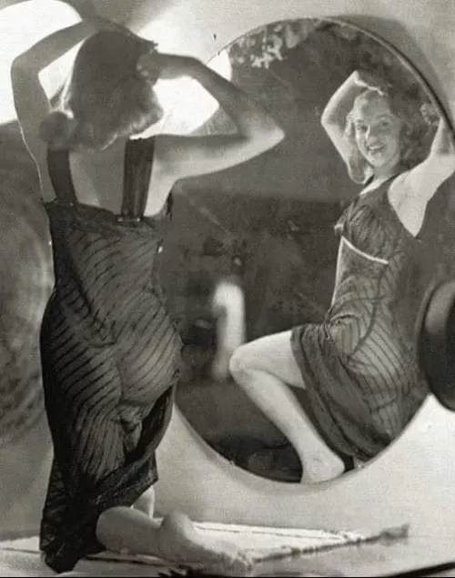 Norma Jeane Mortenson in front of a mirror, 1947. Photo by Earl Moran