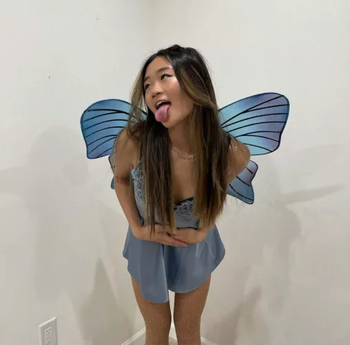 Which one is prettier? A butterfly or her?