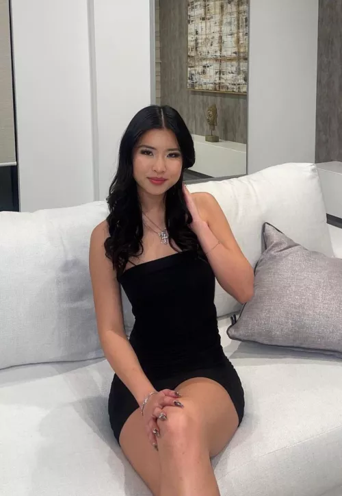 Asian babe in a black dress
